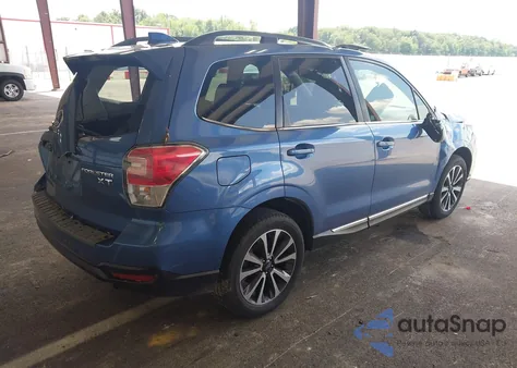 2017 Subaru Forester Touring z USA, uszkodzony, nr VIN JF2SJGTC0HH576884